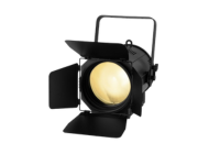 Black stage spotlight with barn doors and yellow light beam
